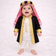 Baby boy wearing traditional black and gold thobe with red and white headscarf
