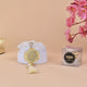 White Crystal Tasbeeh with 100 beads and gold Bismillah charm displayed on a white box, ideal Islamic gift for prayer and special occasions.