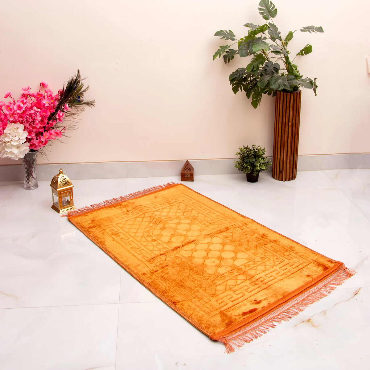 Golden Rectangle Janamaz - Custom Prayer Rug displayed in a serene room with floral decor, ideal for Hajj & Umrah gifts or personal prayer use.