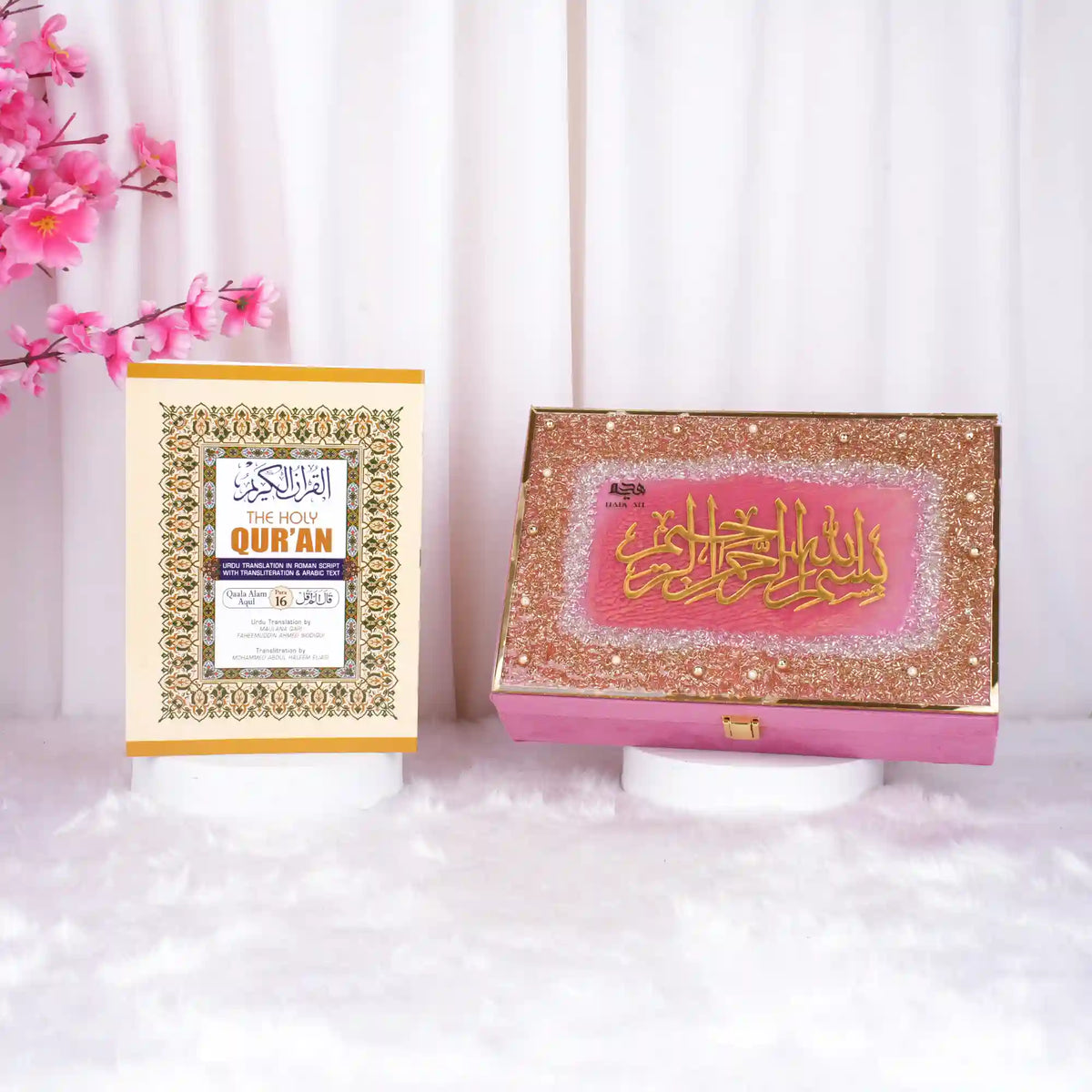 Pink decorated Quran box with floral accents and gold details
