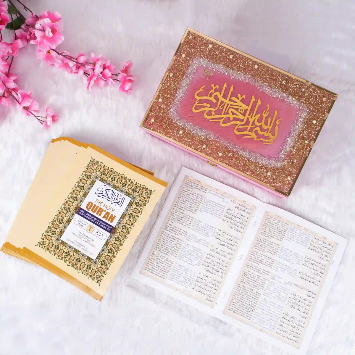 Open Quran with Arabic script and English translation on white background