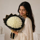 Peaceful White Roses Bouquet — detail of the flowers and wrapping