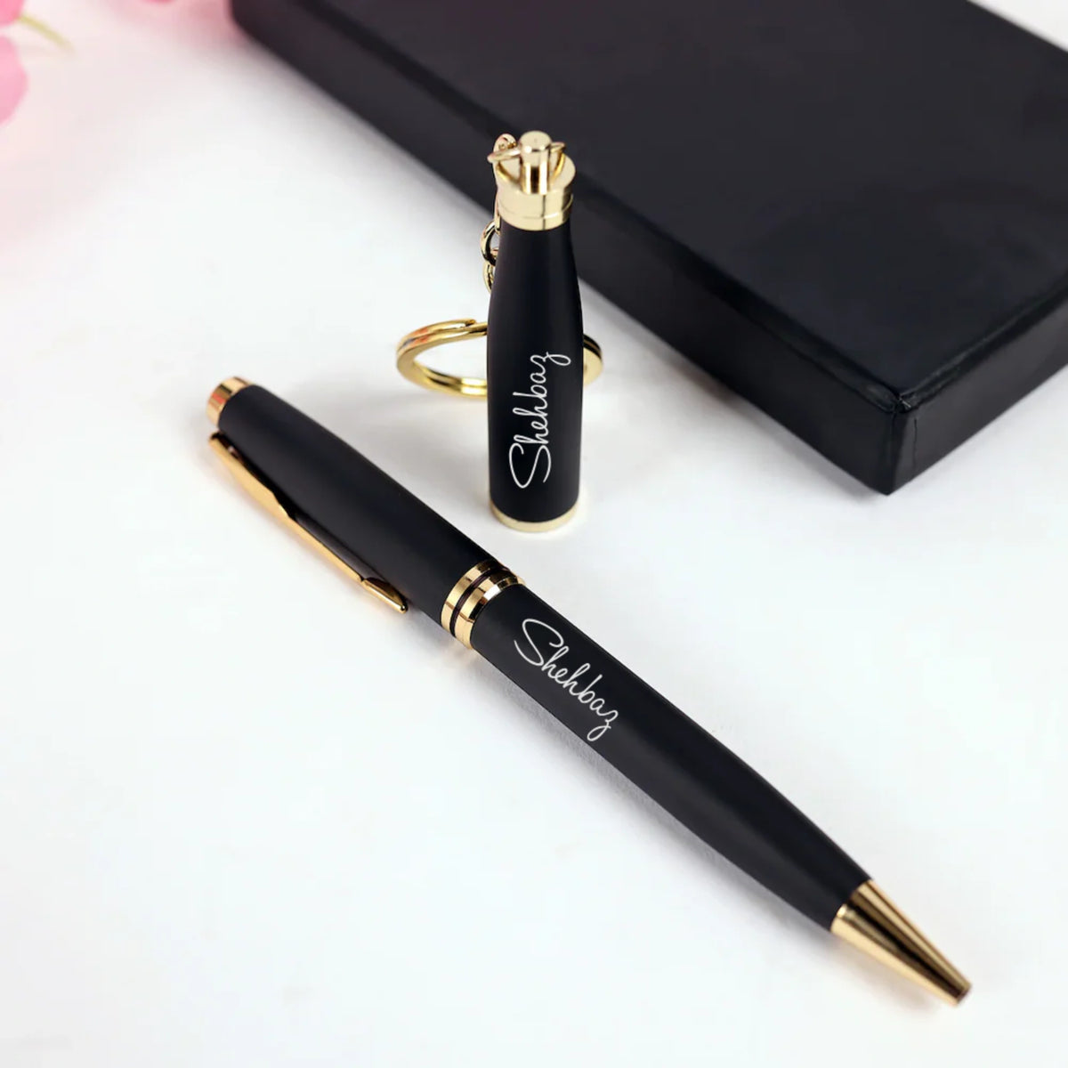 Black personalized pen with gold accents and keychain in gift box