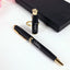 Black personalized pen with gold accents and keychain in gift box