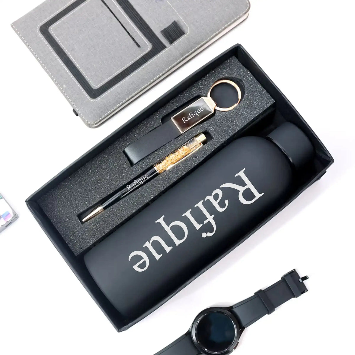 Gift set with personalized keychain, pen, and bottle in black box