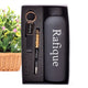 Close-up of personalized keychain, pen, and bottle in gift box