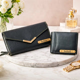 Black leather wallet with yellow stitching and gold accents