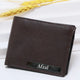 Close-up of brown leather wallet with textured surface
