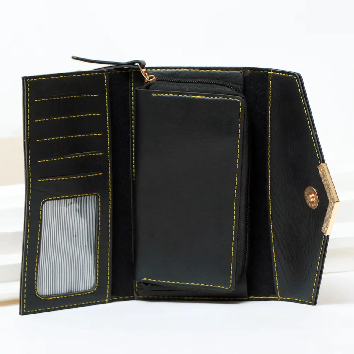Interior view of black leather clutch with card slots