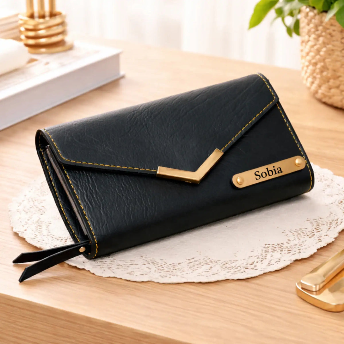 Personalized women's leather clutch with yellow stitching