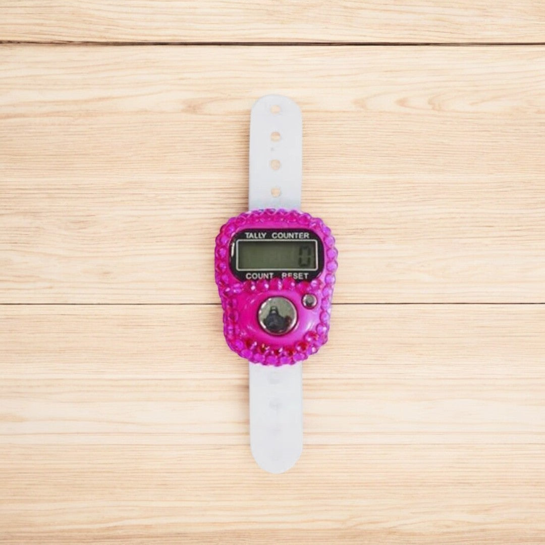 Pink digital tasbeeh counter with adjustable strap, perfect for wedding favors or prayer essentials.