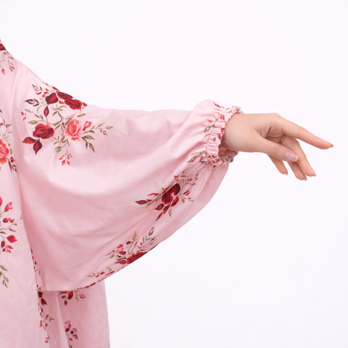 Sleeve detail of Pink Floral Cotton Namaz Makhna with red floral print and gathered elastic wrist for comfortable modest wear.