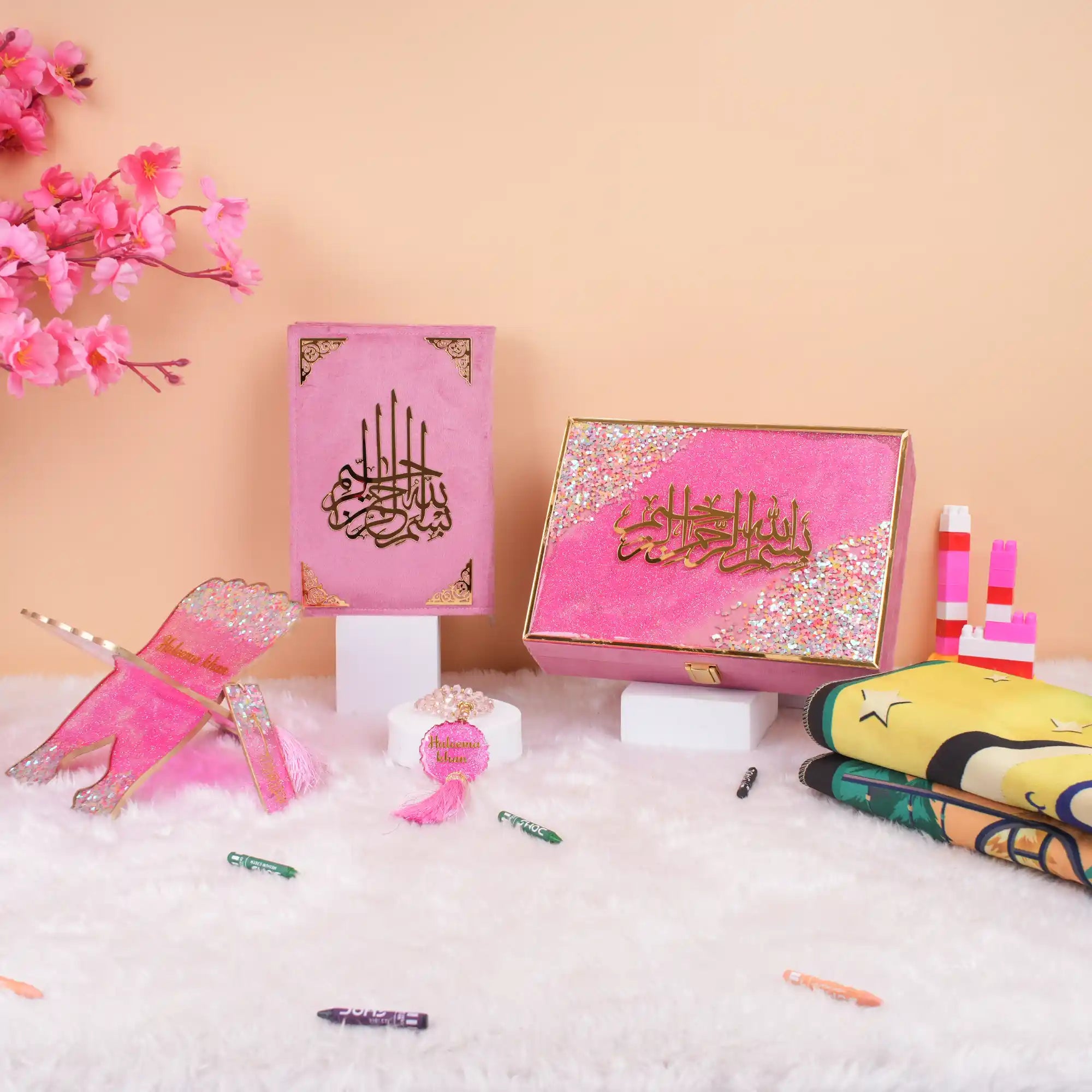 Buy Pink Kids Glitter Collection Ibadah Gift Set for Kids Online featuring a glittery pink Quran cover, tasbih, and prayer accessories, ideal for Ramadan & Eid gifts.