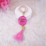 Buy Pink Kids Glitter Collection Ibadah Gift Set for Kids Online featuring a personalized pink tasbeeh with name 'Haleema Khan' and pink tassel. Ideal for Ramadan & EID gifts for kids.