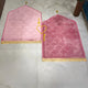 Velvet-textured pink prayer mats with gold fringe, included in the Sawab-e-Jariya bridal hamper. Elegant Islamic wedding gift set.