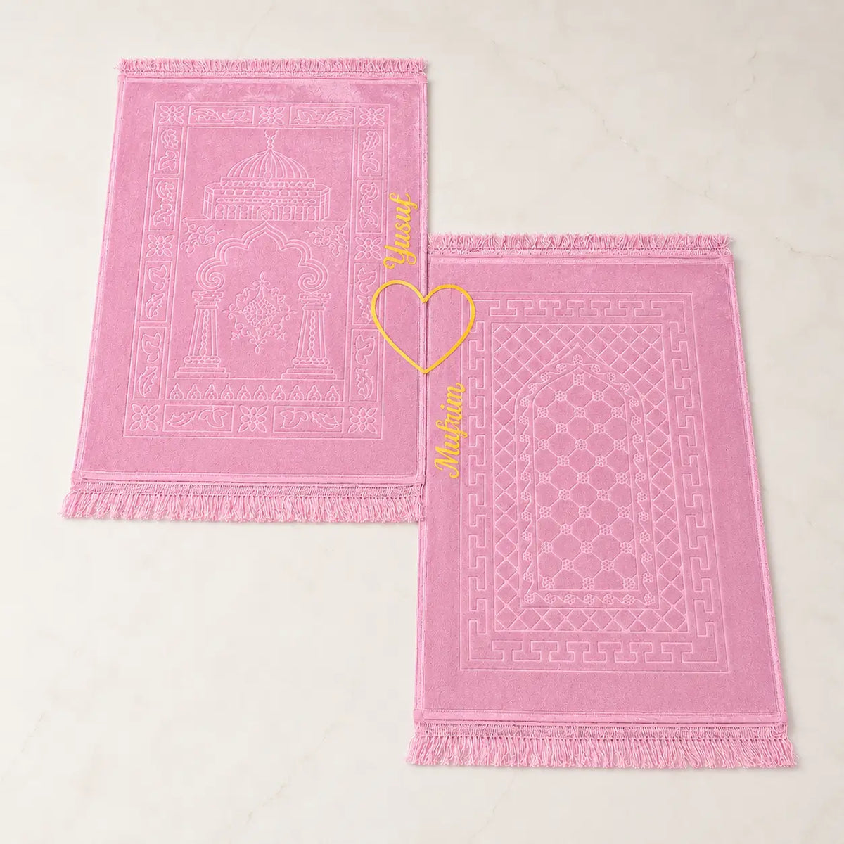 Set of two pink prayer mats with Islamic patterns, part of the Sawab-e-Jariya bridal gift hamper. Ideal for couple prayer gifting.