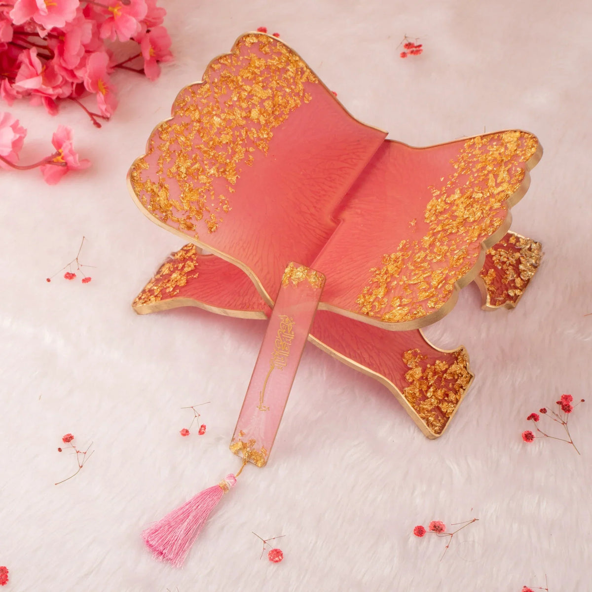 Pink and gold Quran stand with matching bookmark, part of the Sawab-e-Jariya bridal gift set. Elegant Islamic wedding gift accessory.