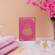 Custom Pink Salah Hamper featuring Quran on pedestal, soft pink prayer mat, and crystal Tasbeeh. Perfect for Ramadan or Eid gifting.