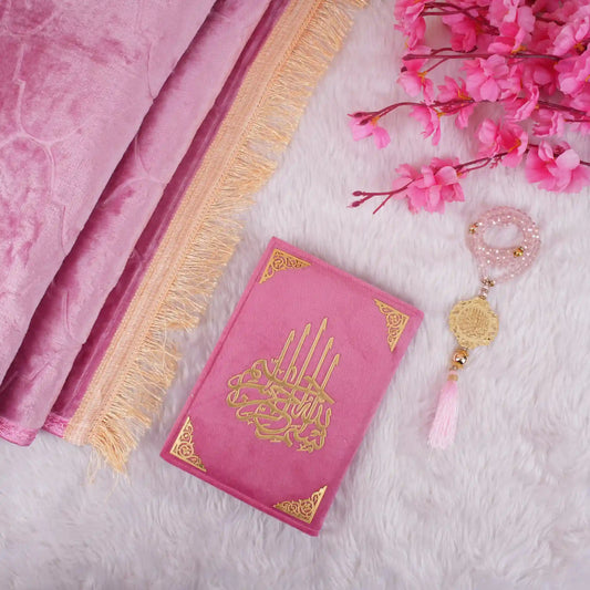 Custom Pink Salah Hamper includes premium velvet Quran, pink prayer mat, and crystal Tasbeeh with golden charm. Elegant Islamic gift set.