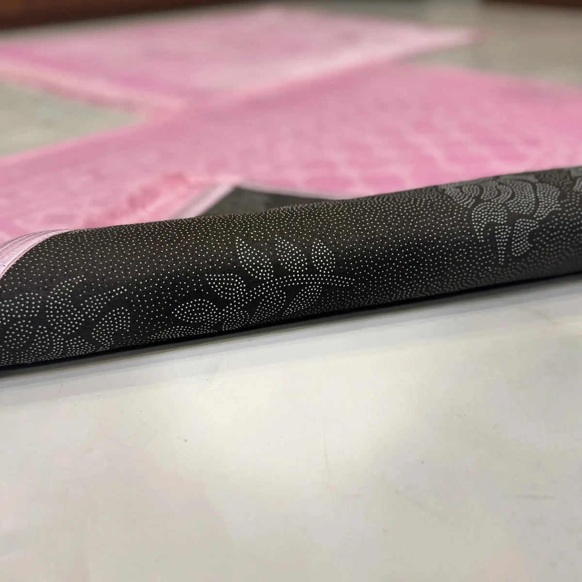 Underside of Couple Janamaz Set showing anti-slip floral pattern backing, ensuring comfort and stability during prayer rituals.
