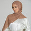 Biscotti Beige Chiffon Hijab styled on model with smooth, lightweight drape. Premium modest fashion headwear for elegant everyday wear.