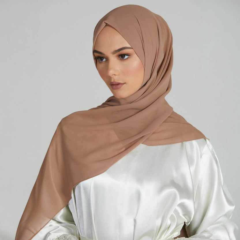 Biscotti Beige Chiffon Hijab styled on model with smooth, lightweight drape. Premium modest fashion headwear for elegant everyday wear. Main image