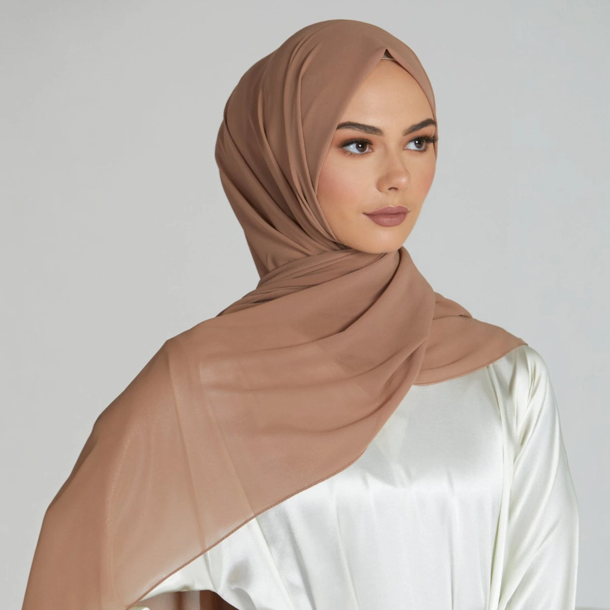 Premium Biscotti Beige Chiffon Hijab worn with satin outfit. Non-slip, breathable headwear ideal for modest fashion styling.