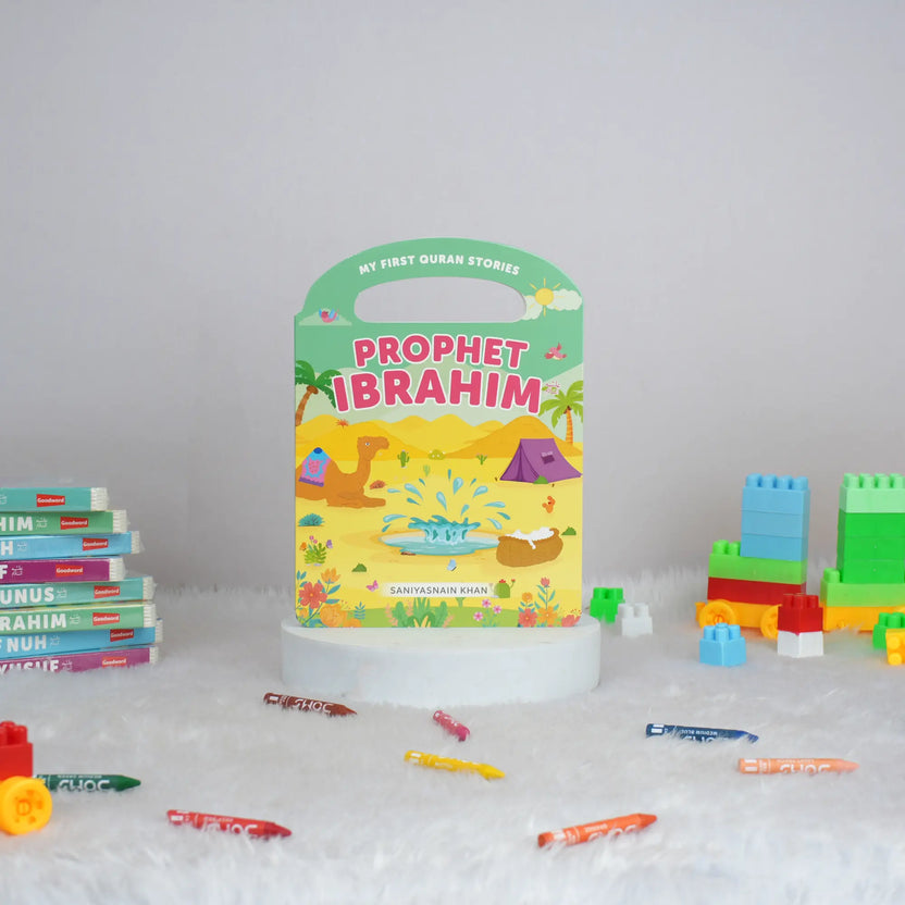 Children's book titled 'Prophet Ibrahim' with building blocks and pens on a white surface Main image