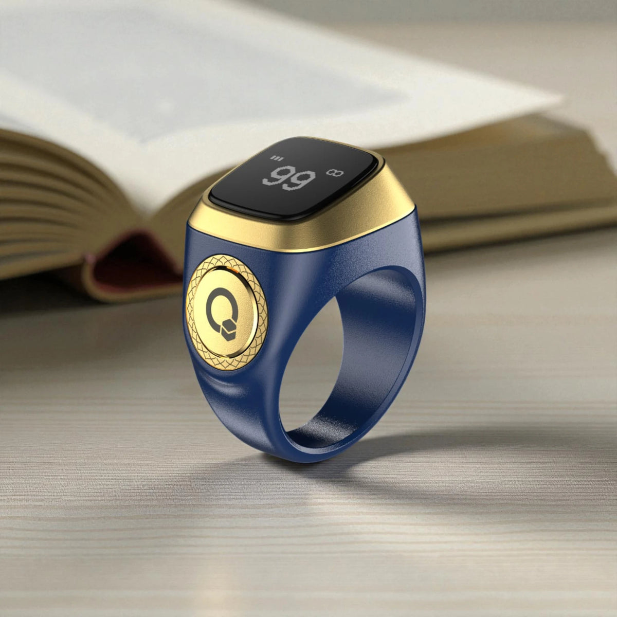 Blue and gold Zikr Ring smart tasbeeh with OLED display and digital counter, ideal for prayer tracking and reminders.