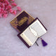 Velvet Mini Quran Box with open Purple Flakes Mini Tilawat-e-Quran and feather bookmark, ideal handmade Islamic gift from India.