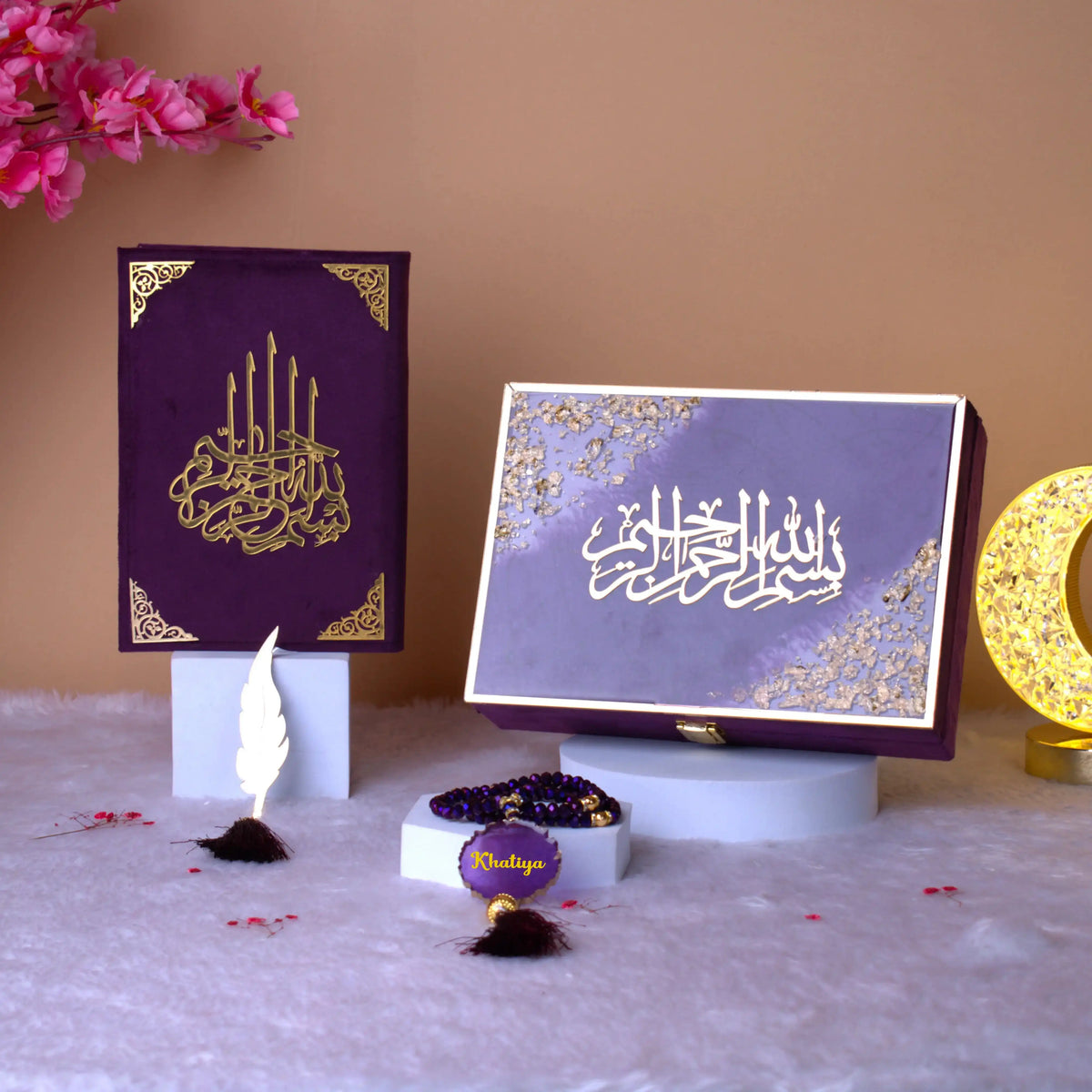 Elegant Tilawat-e-Quran Gift Set featuring purple Quran, personalized Tasbeeh, and decorative box with golden Arabic calligraphy. Perfect for weddings.