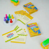 Quran Explorer Game set with cards, dice, and colorful pieces on a white background