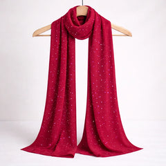 Red Studded Hijab displayed on hanger, showcasing lightweight chiffon fabric with elegant stud detailing, perfect for versatile modest styling.