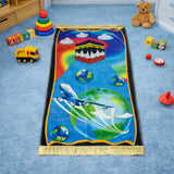 Kids Prayer Mat - Personalized Mat | Janamaz for Kids with a Kaaba and Earth design, airplane illustration, and colorful educational toys.