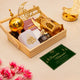 Decorative set with gold lanterns, prayer mat, and 'Ramadan Mubarak' card on a beige background.