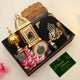 Complete Ramadan Kareem Hamper Gifts set with greeting card, Quran, ittar, bakhoor burner, and sweets, perfect for Eid gifting.