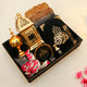 Premium Ramadan Kareem Hamper Gifts with black velvet Quran, bakhoor burner, ittar, and sweets, ideal for gifting during Ramadan.