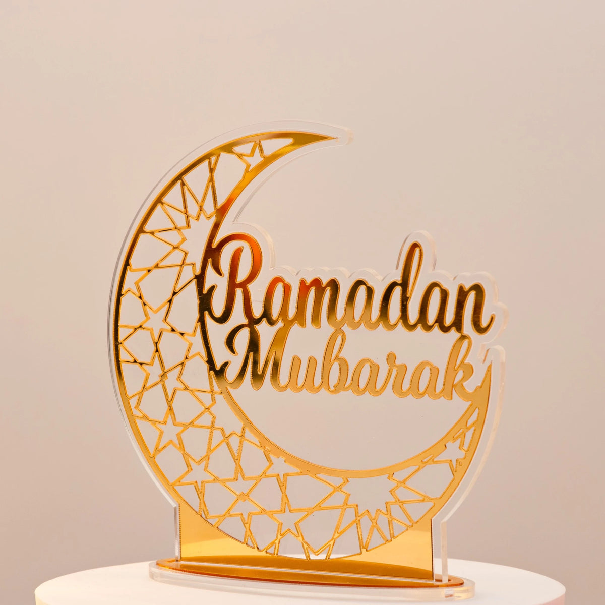 Close-up of Ramadan Mubarak Stand featuring intricate gold crescent moon and star detailing. Perfect for Ramadan home or office decoration.