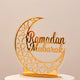 Close-up of Ramadan Mubarak Stand featuring intricate gold crescent moon and star detailing. Perfect for Ramadan home or office decoration.