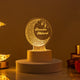 Decorative lamp with 'Ramadan Mubarak' text on a warm background