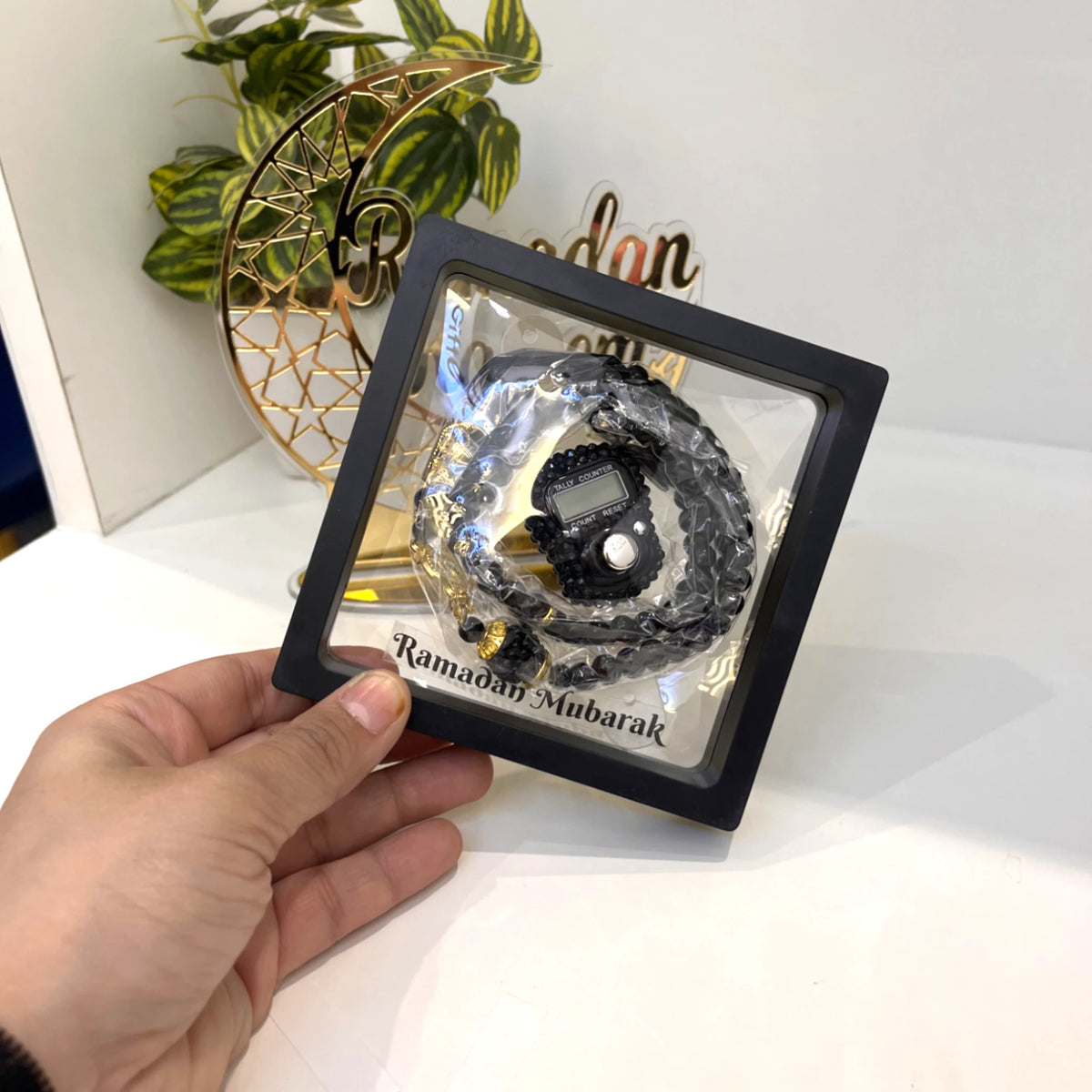 Black Ramadan Mubarak Tasbeeh Combo with digital counter and black beads in a black frame. Suitable for daily spiritual practice.