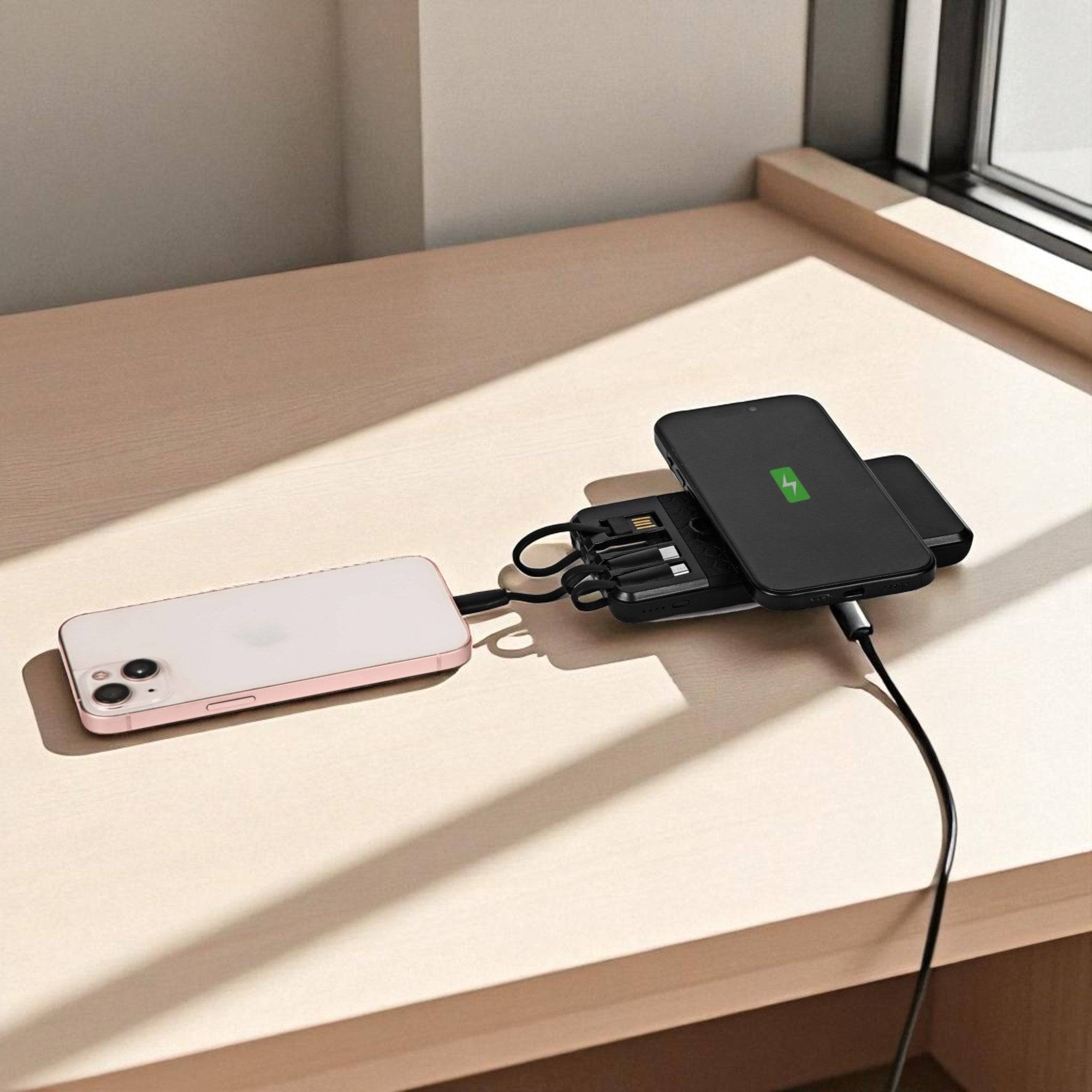 Multi-device charging station on a desk.
