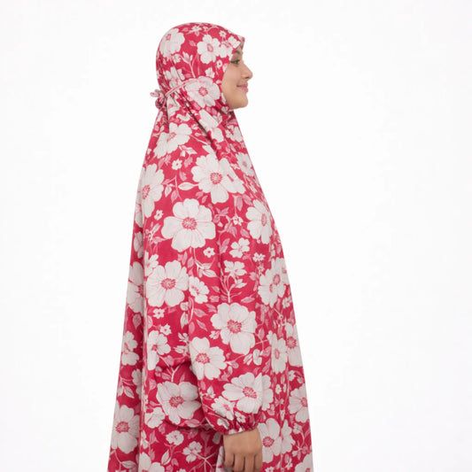 Side view of floral chiffon prayer dress showcasing its loose, comfortable fit and secure head covering for modest fashion needs.
