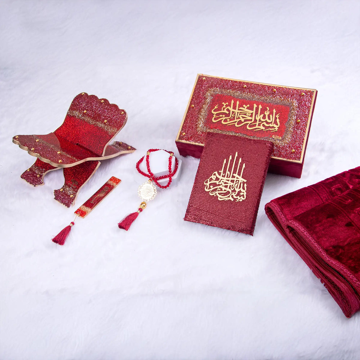 Maroon Bridal Hamper from The Bling Collection featuring Quran, Janamaz, tasbih, and accessories. Ideal premium Quran gift set for weddings and Nikkah.