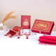 Maroon Bridal Hamper from The Bling Collection featuring a premium Quran gift set with Janamaz, tasbeeh, and decorative box. Ideal for Nikkah and wedding gifts.