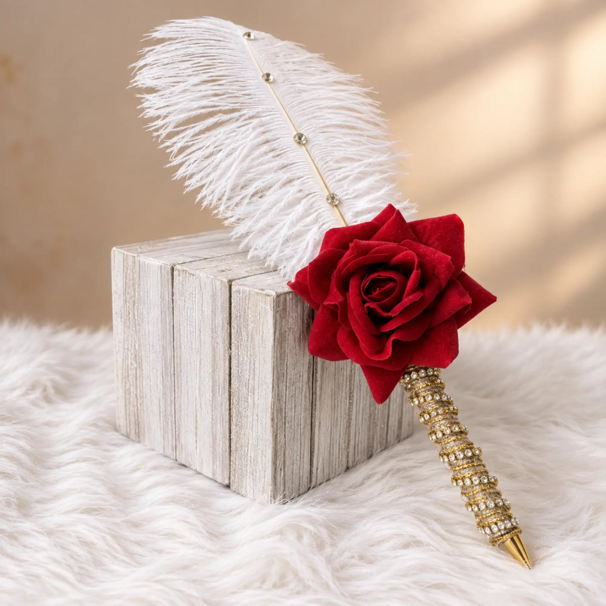 Decorative feather pen with red rose and gold embellishments from Amaanat-e-Nikaah Sawab-e-Jariya Nikah gift set.