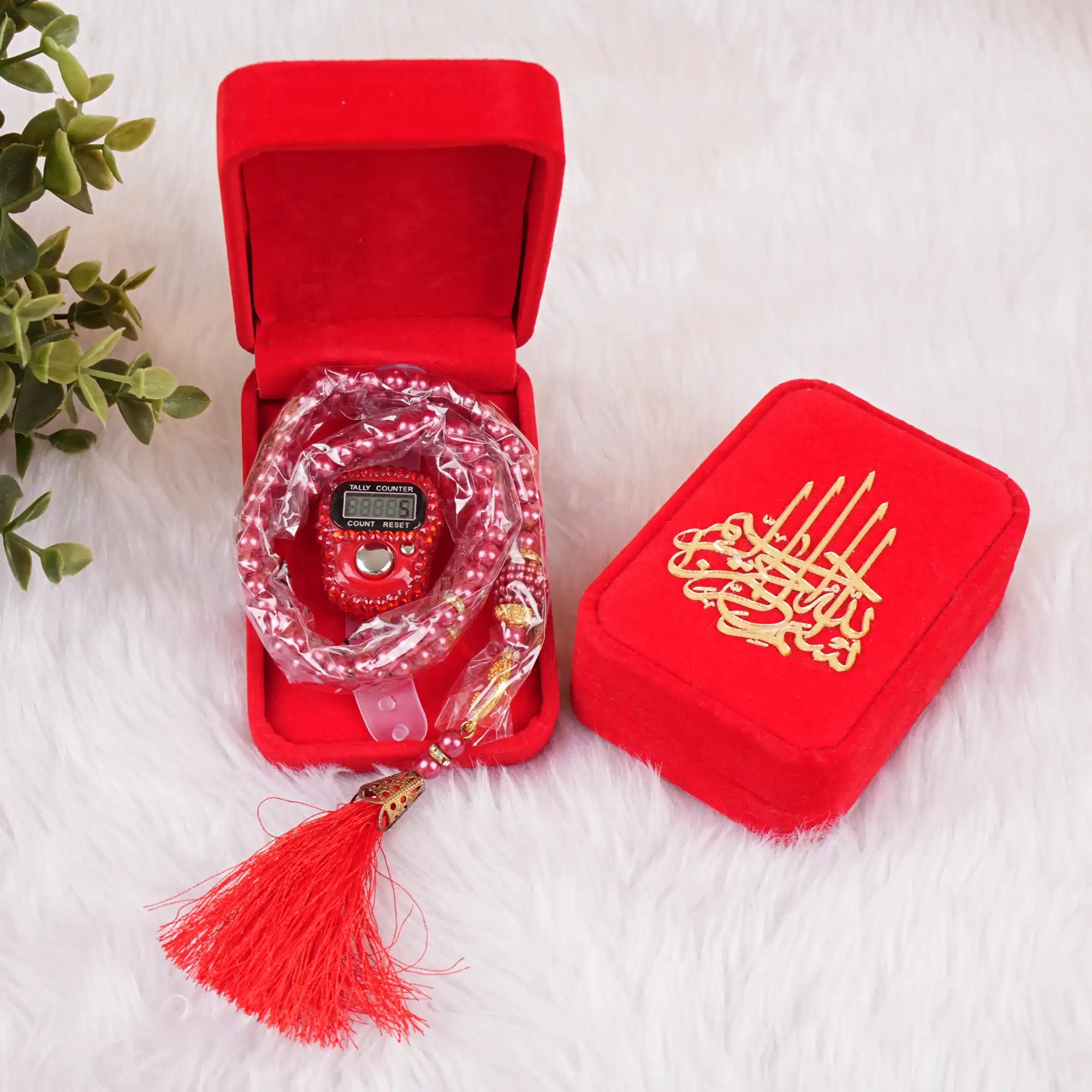 Red Velvet Tasbeeh Combo featuring a digital tasbeeh counter and 100-bead pearl tasbeeh in a red velvet box with Islamic calligraphy. Ideal for Ramadan gifts. Main image