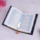Open Quran with Urdu translation and gold feather bookmark. Included in the Sawab-e-Jariya Bridal Gift set for spiritual gifting.
