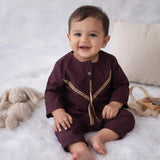 Baby boy wearing maroon thobe romper with gold detailing, ideal for Eid gifts and Islamic festive wear in the Kids Collection.