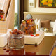 Jars of dried fruits and candied treats from the Sadaqah Sweets Festive Hamper, perfect for gourmet gift baskets and festive celebrations.